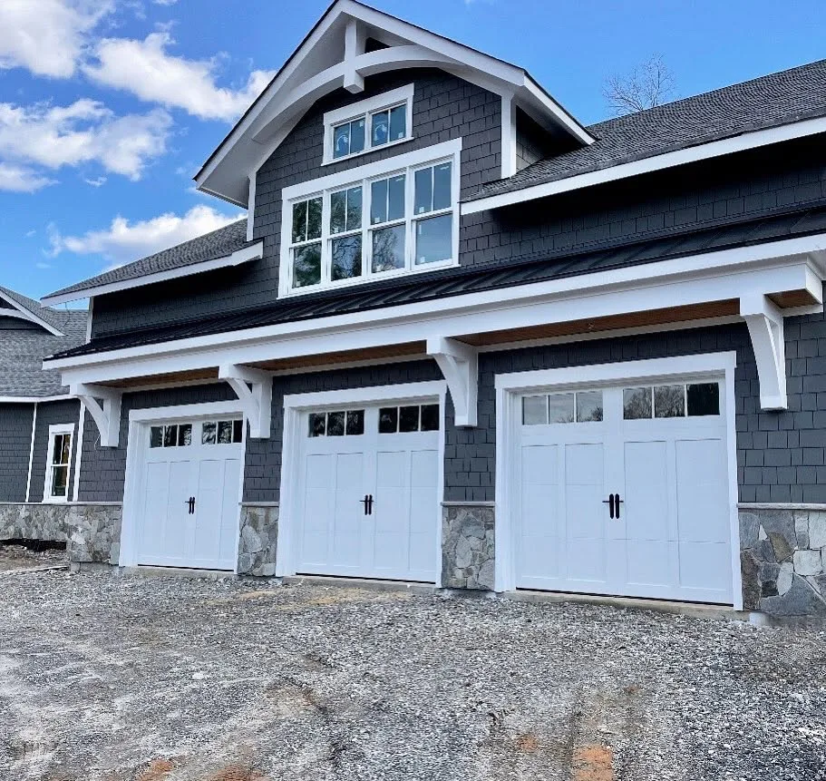 White traditional raised-panel garage doors